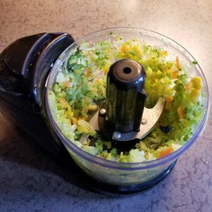 food chopper with chopped thawed frozen vegetables