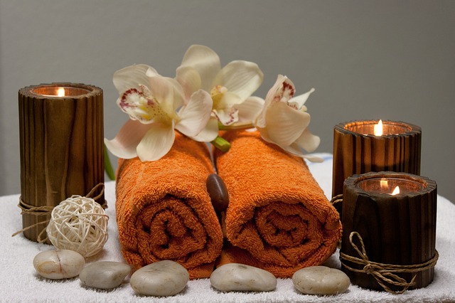 spa day candles stones towels